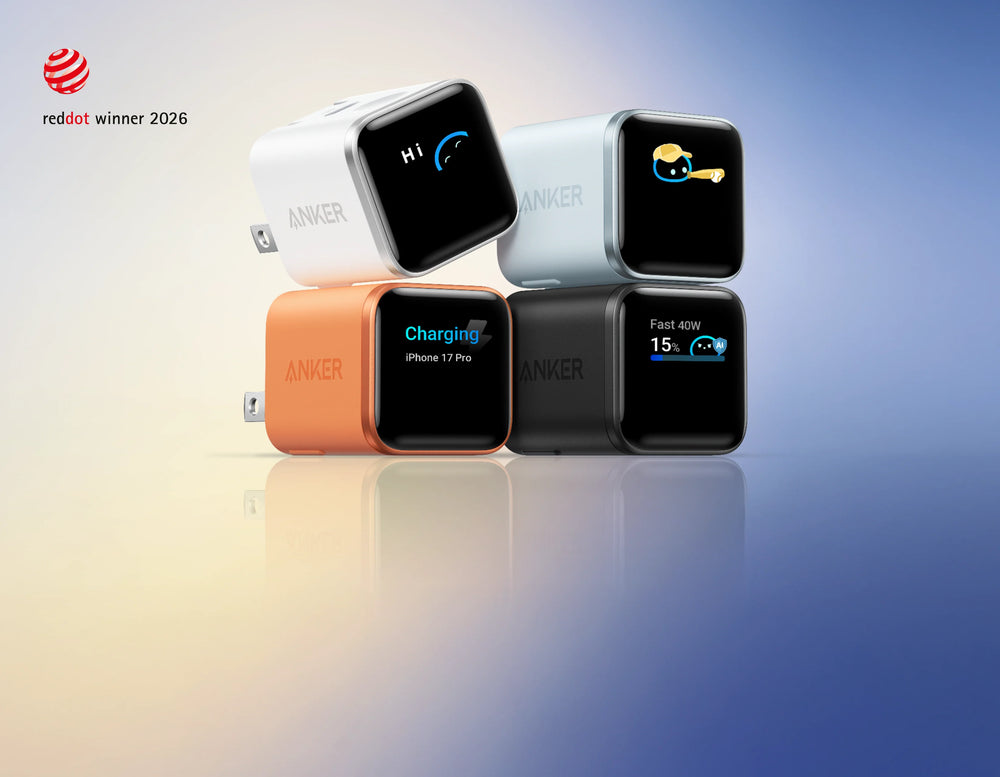Anker power adapters in various colors on a gradient background with 'Red Dot Winner 2026' badge.